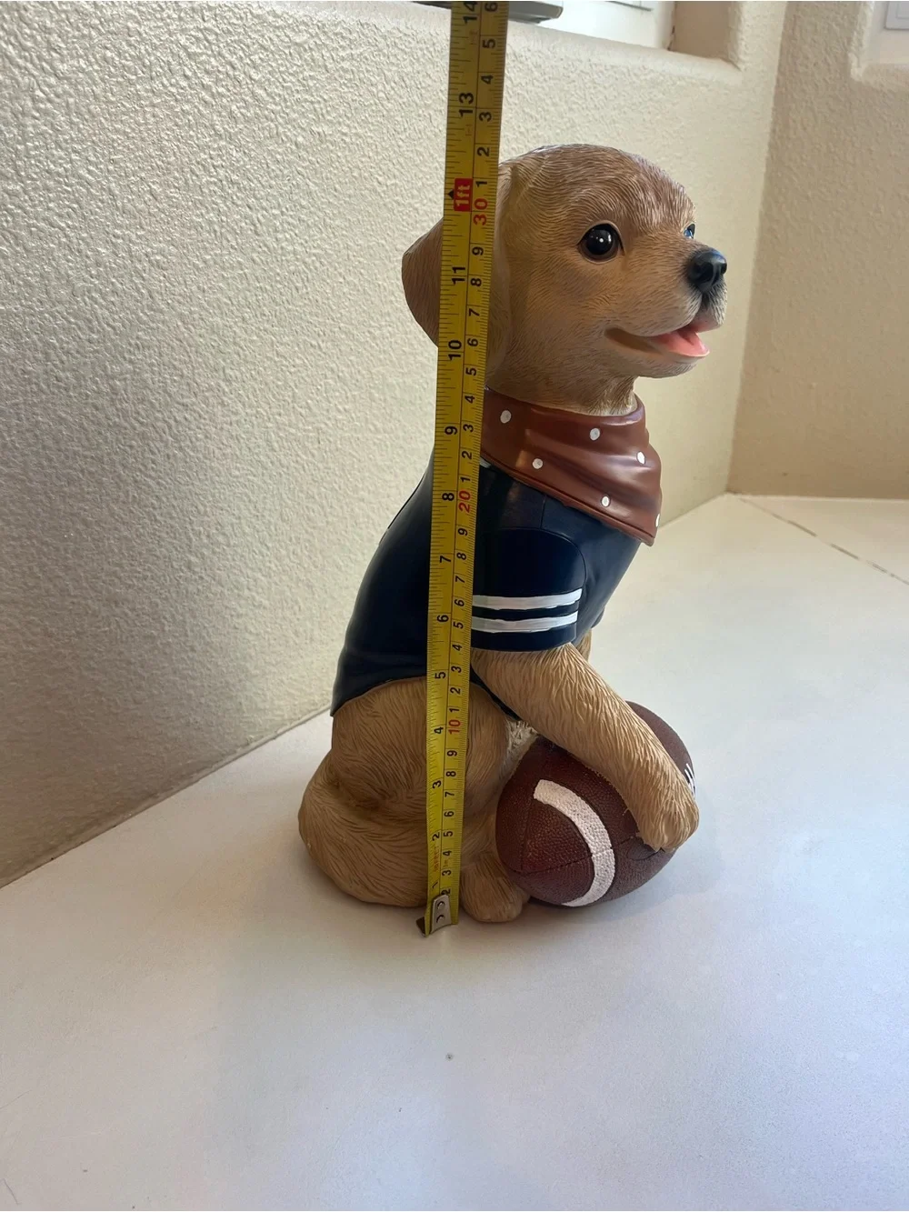 Brown Labrador Dog Figurine holding Football and Wearing a #1 Jersey